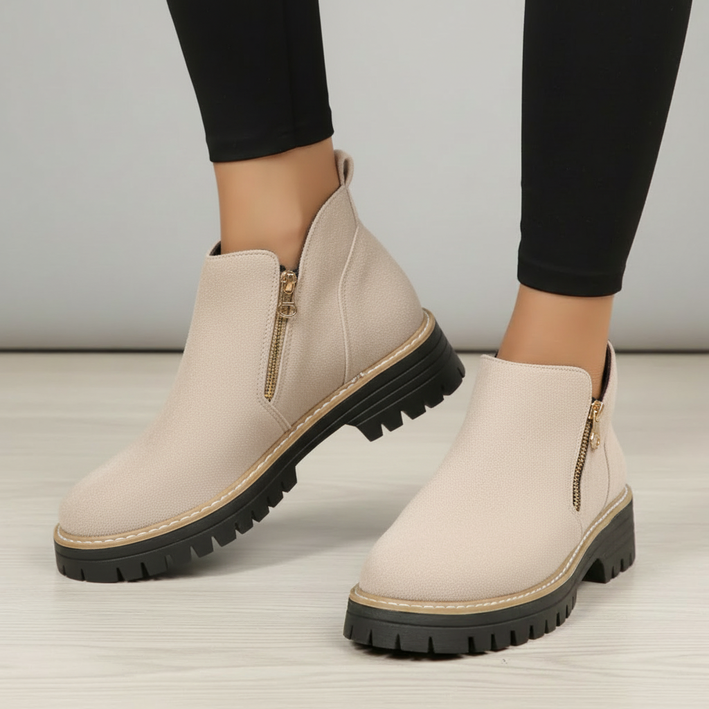 Beige boots with grey background
