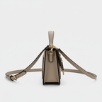 Beige leather crossbody side view