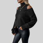 Black cold-shoulder sweater side view