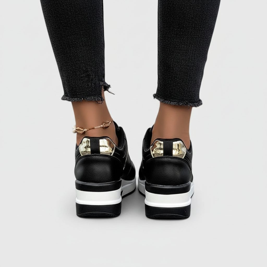 Black platform wedge sneakers back view