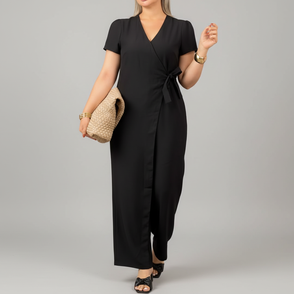 Black short sleeve wrap jumpsuit studio shot