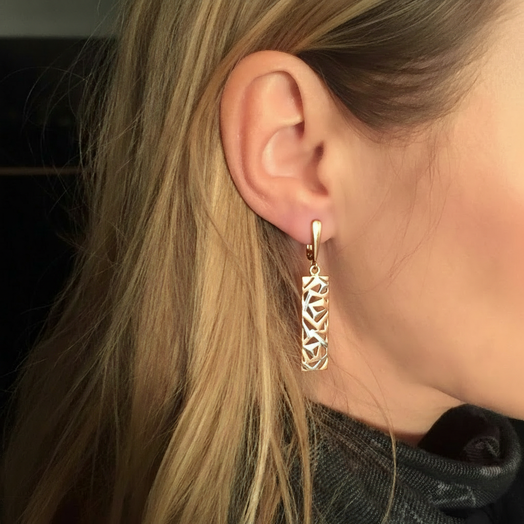 Blonde model wearing rose gold geometric earrings