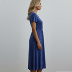 Blue polka dot dress side view