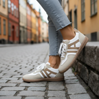 Cream sneakers elevated angle