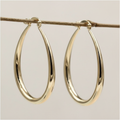 Gold teardrop hoop earrings