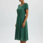 Green polka dot dress side view