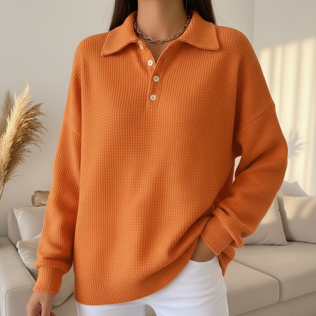 Orange knit polo sweater detail shot