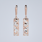 Rose gold geometric earrings studio shot
