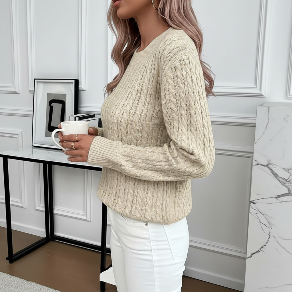 Side view of beige cable knit sweater