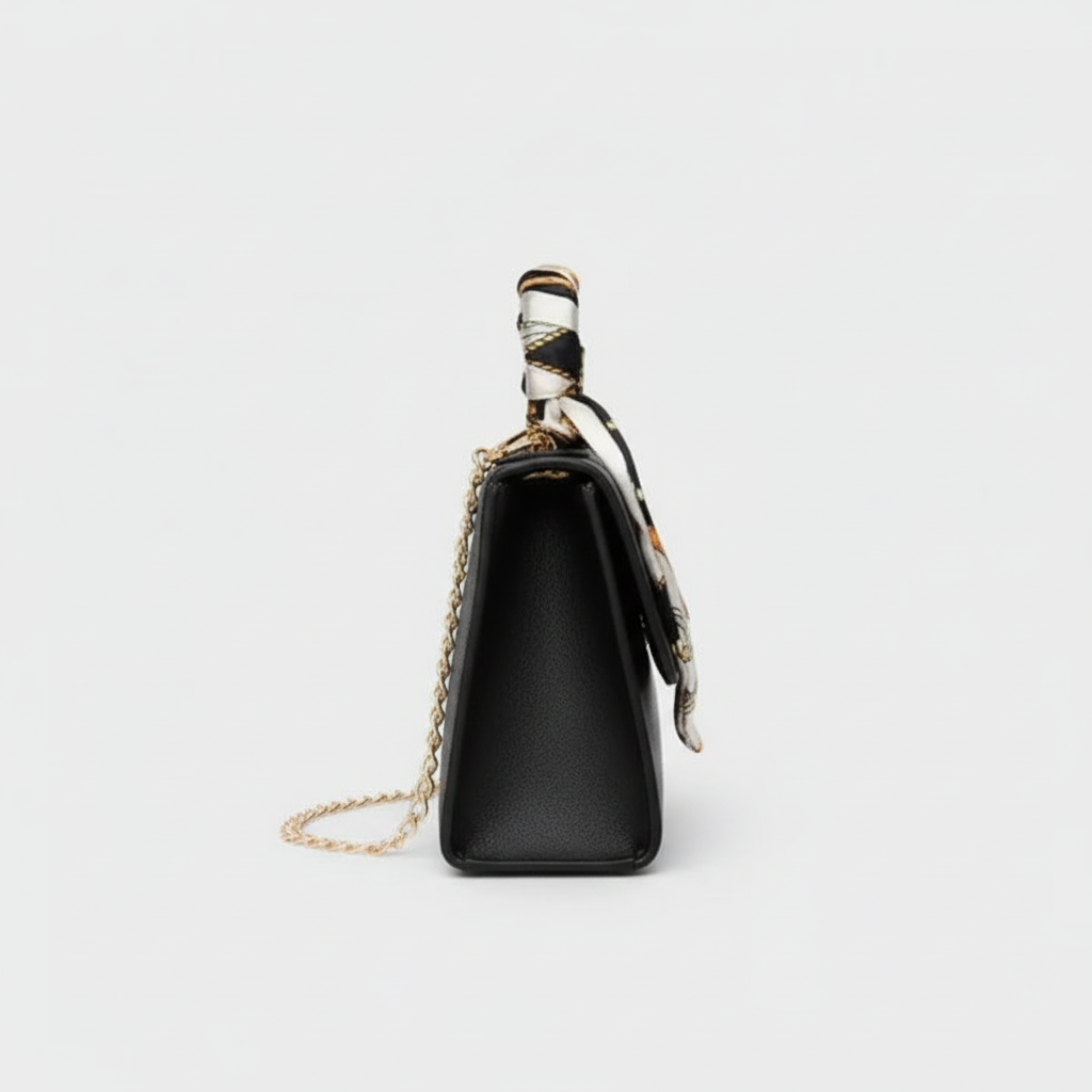 Side view of black handbag