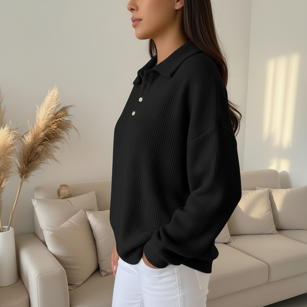 Side view of black polo sweater