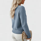Side view of blue sweater