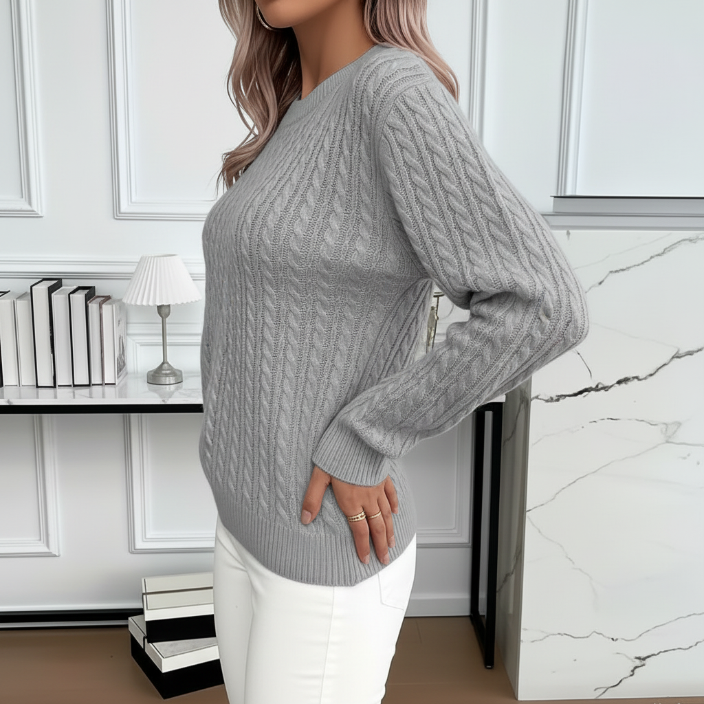 Side view of gray cable knit sweater