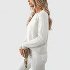 Side view of white sweater