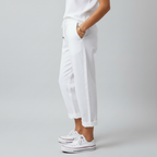 Side view – White relaxed trousers