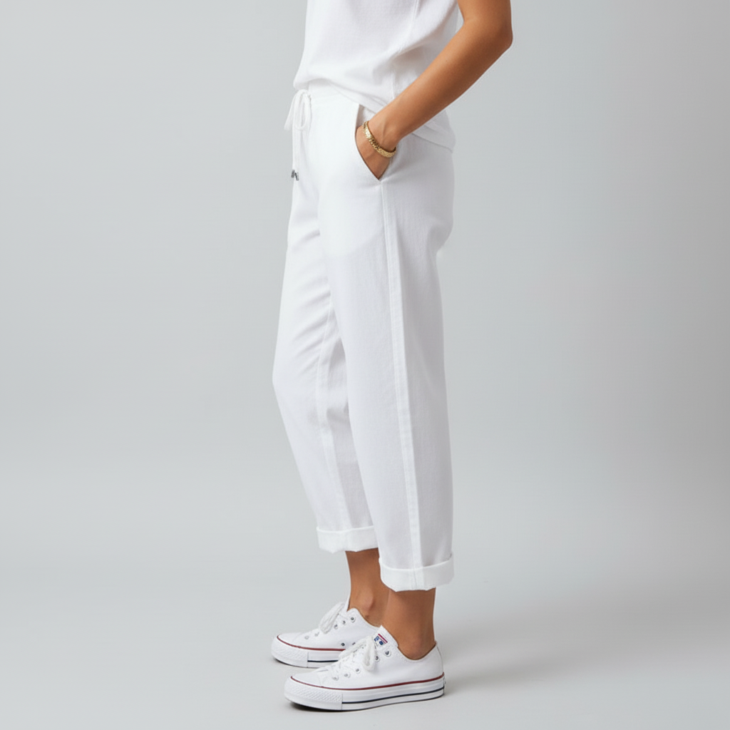 Side view – White relaxed trousers
