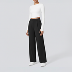 Studio pose – Black wide-leg trousers