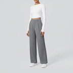 Studio pose – Grey wide-leg trousers