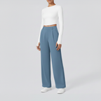 Studio pose – Light blue wide-leg trousers