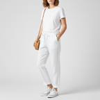 Studio pose – White relaxed trousers