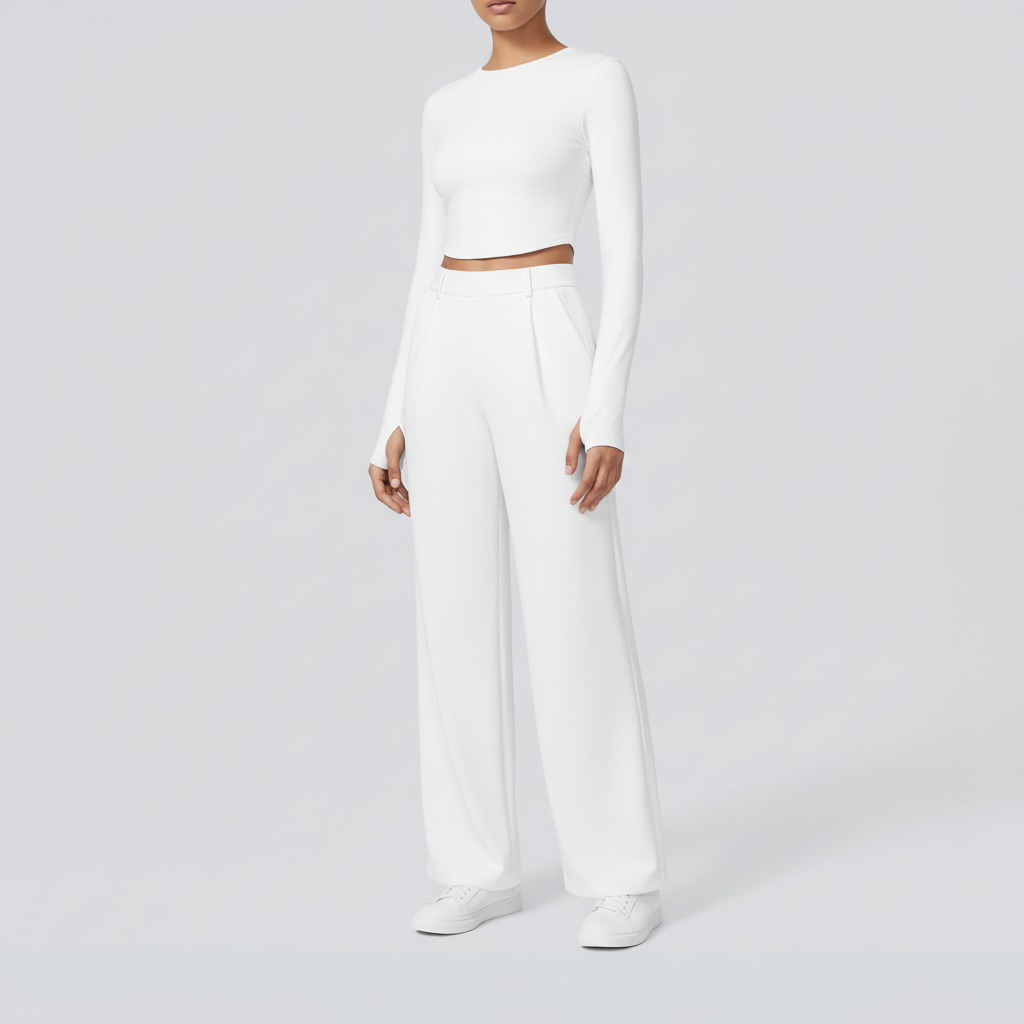 Studio pose – White wide-leg trousers