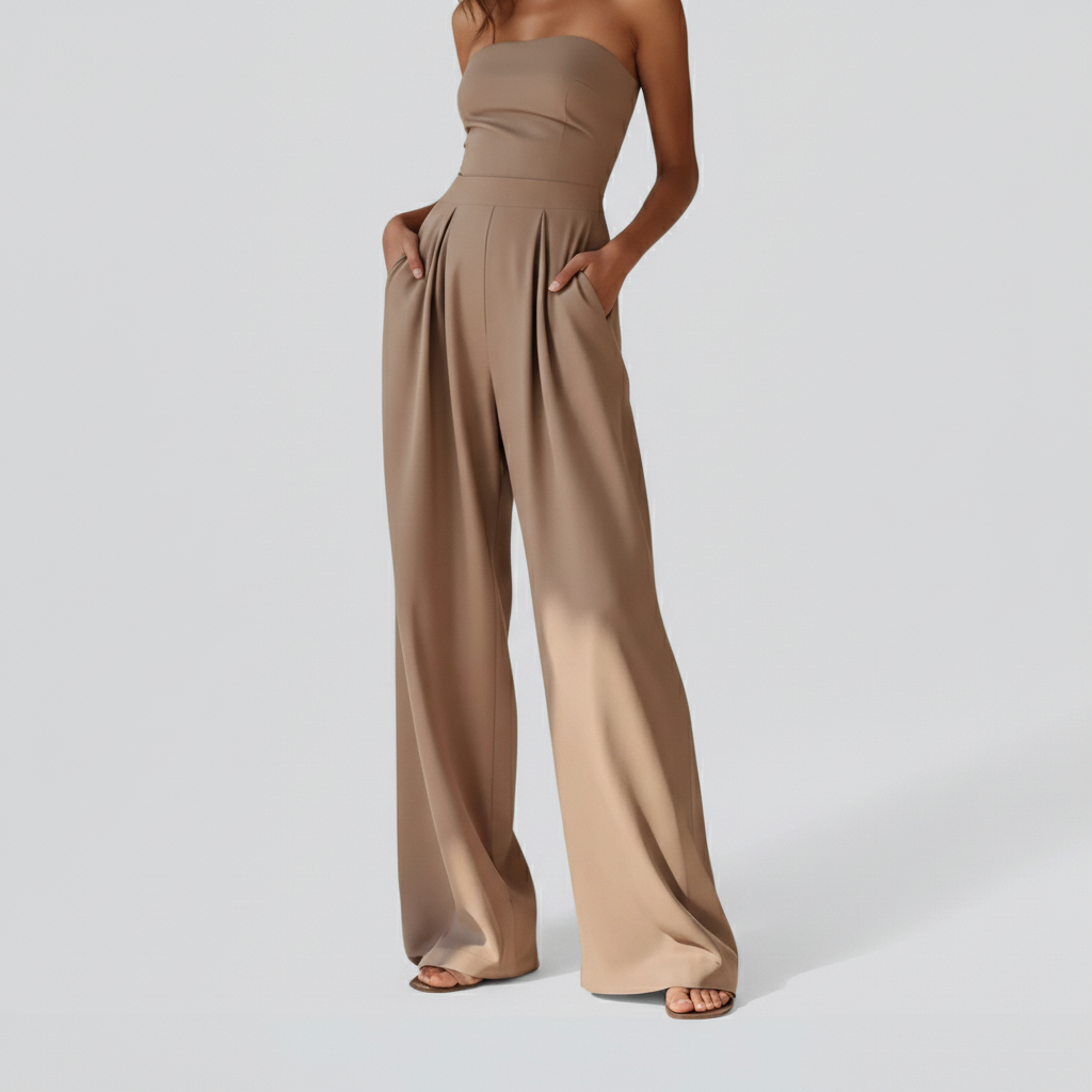 Studio product shot of beige jumpsuit from shoulders down