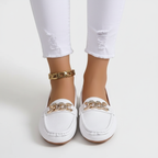 White leather loafers front view